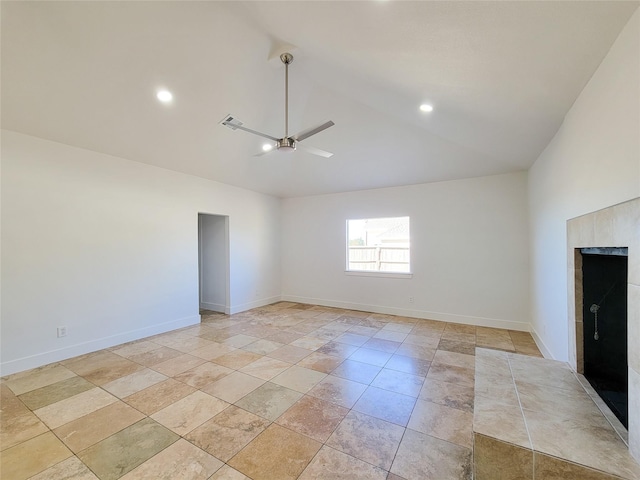 empty room featuring high vaulted ceiling and ceiling fan