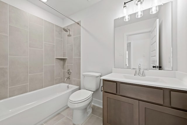 full bathroom with vanity, tile patterned floors, tiled shower / bath combo, and toilet