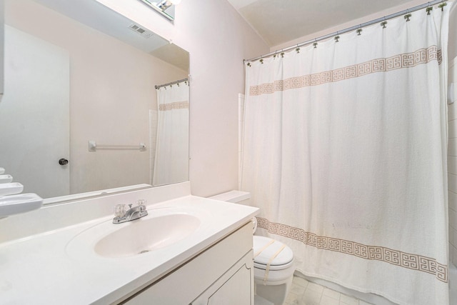 bathroom featuring vanity, curtained shower, toilet, and visible vents