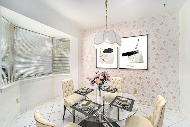 tiled dining area with wallpapered walls and baseboards
