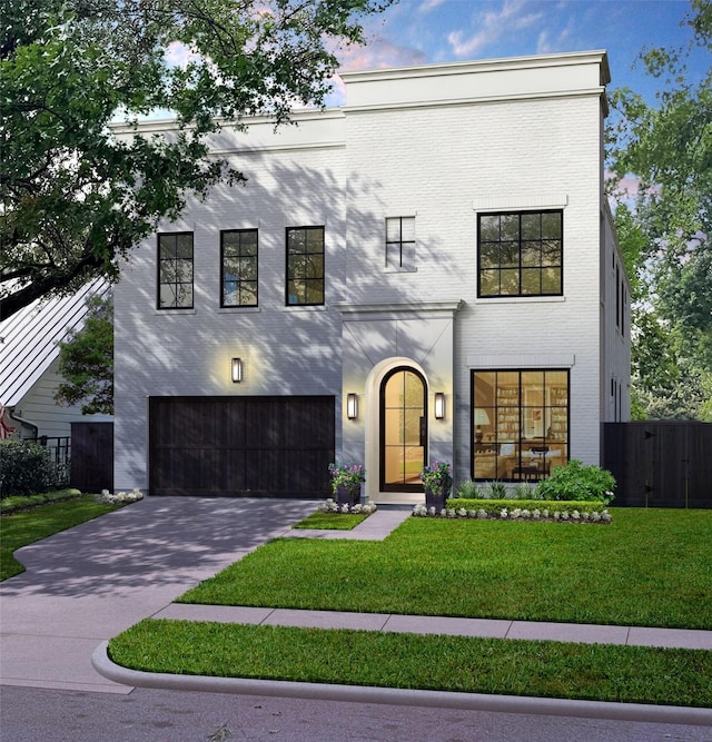 view of front facade with brick siding, fence, a garage, driveway, and a front lawn