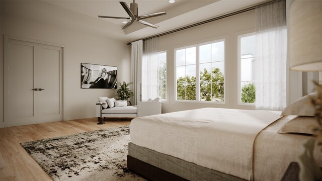 bedroom featuring wood-type flooring and ceiling fan