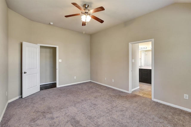 unfurnished bedroom with ceiling fan and light carpet