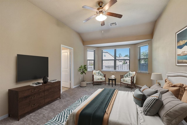 bedroom featuring ceiling fan, light carpet, and vaulted ceiling