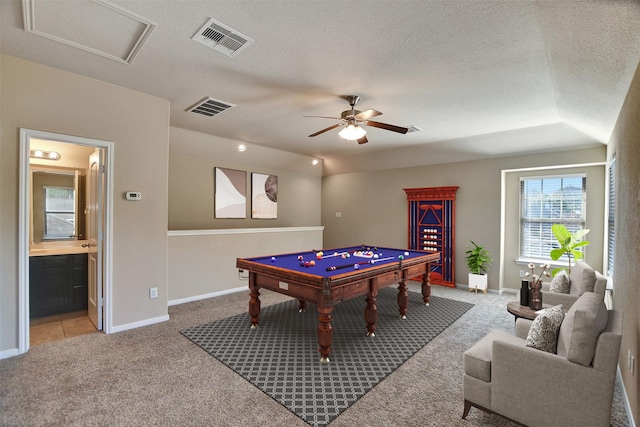 playroom with ceiling fan, light carpet, a textured ceiling, and pool table