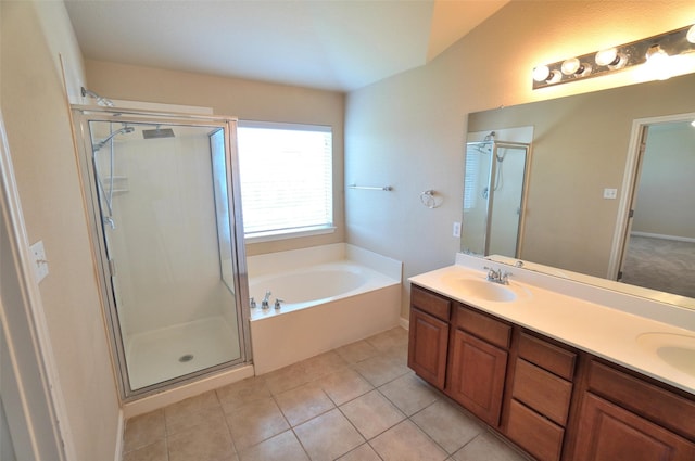 bathroom featuring tile patterned floors, vanity, and independent shower and bath