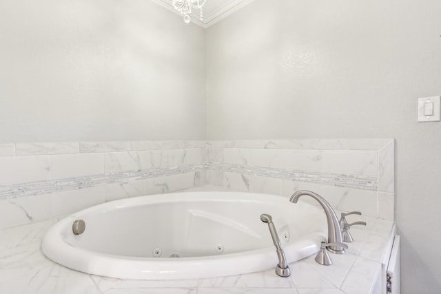 bathroom with a relaxing tiled tub and crown molding