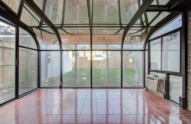 unfurnished sunroom featuring cooling unit