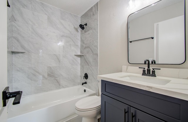 full bathroom with tiled shower / bath combo, toilet, a textured ceiling, and vanity