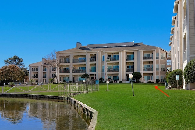 view of building exterior featuring a water view