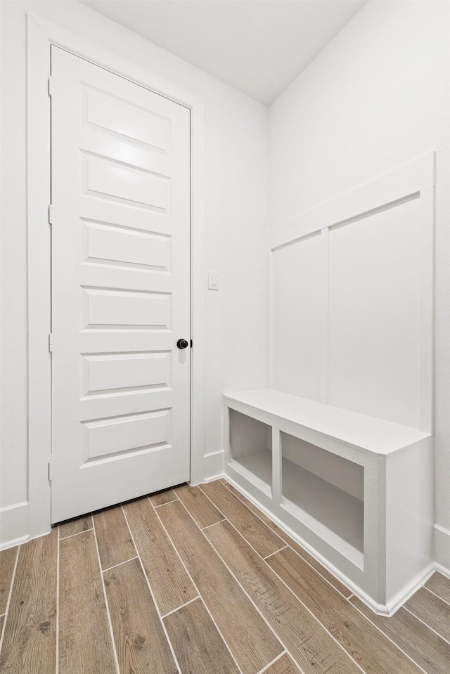 mudroom with hardwood / wood-style floors