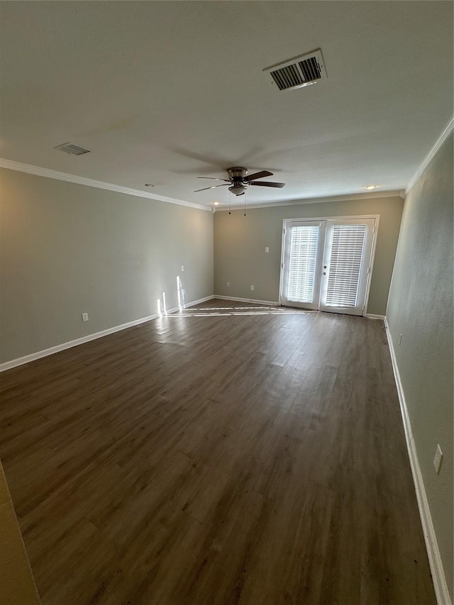 unfurnished room featuring ceiling fan, ornamental molding, and dark wood-type flooring