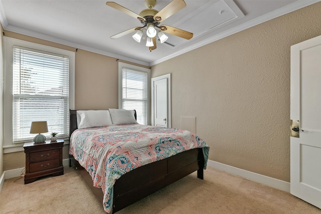 bedroom with ceiling fan, light colored carpet, crown molding, and multiple windows