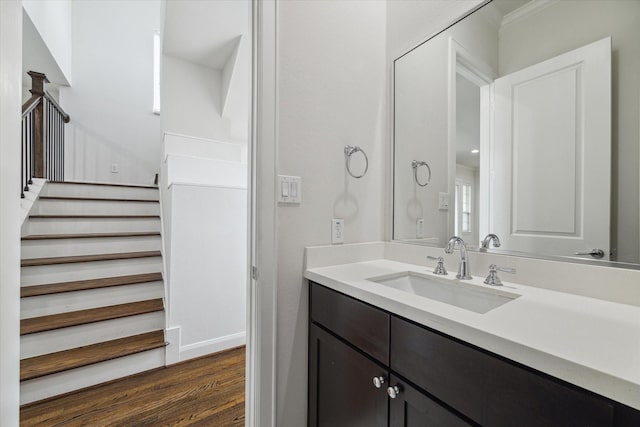 bathroom featuring vanity and hardwood / wood-style flooring