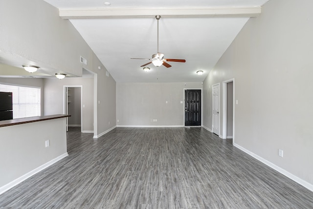 unfurnished living room with ceiling fan, beam ceiling, and dark hardwood / wood-style flooring