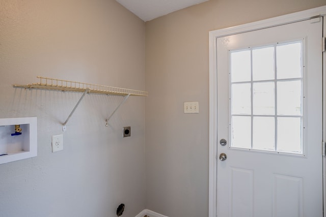 laundry room featuring hookup for an electric dryer, washer hookup, and plenty of natural light