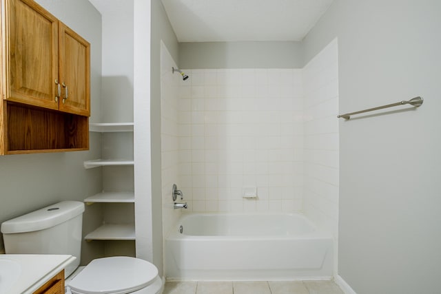 full bathroom with tile patterned floors, vanity, toilet, and tiled shower / bath