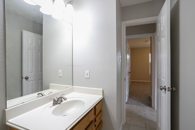 bathroom with vanity and tile patterned floors