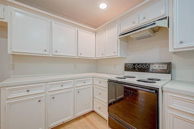 kitchen featuring range with electric stovetop, white cabinetry, a textured ceiling, and light hardwood / wood-style flooring