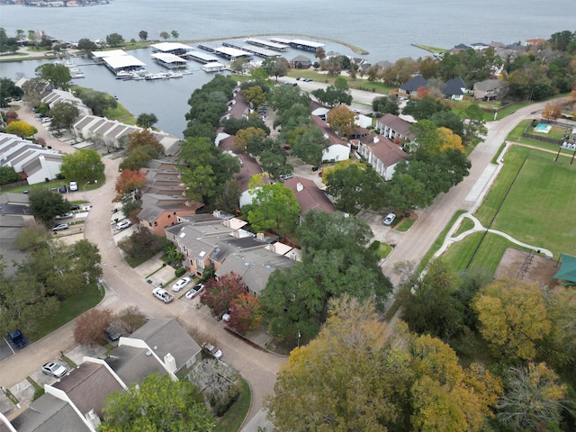 birds eye view of property featuring a water view