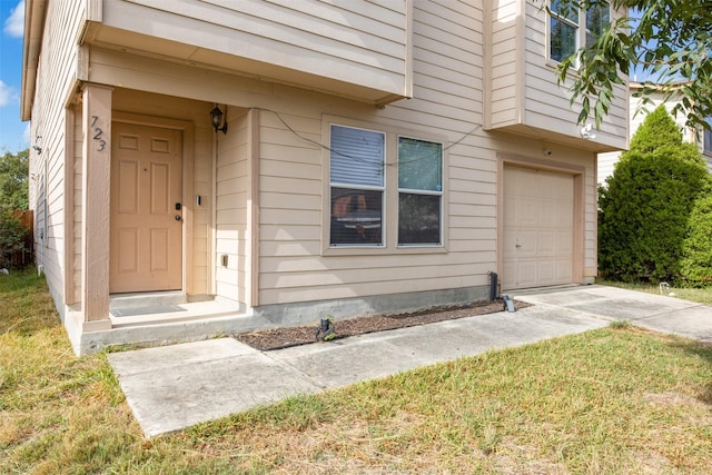 property entrance with a garage