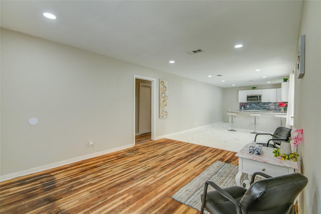 living room featuring light hardwood / wood-style floors