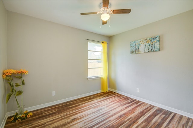 unfurnished room featuring hardwood / wood-style floors and ceiling fan