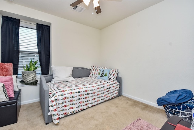 carpeted bedroom featuring ceiling fan