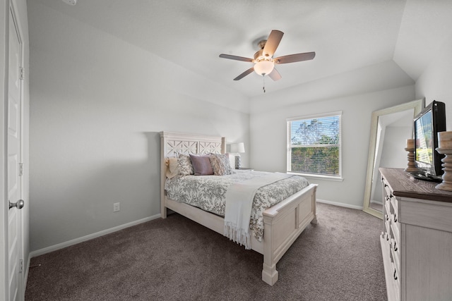 bedroom with lofted ceiling, carpet, and baseboards