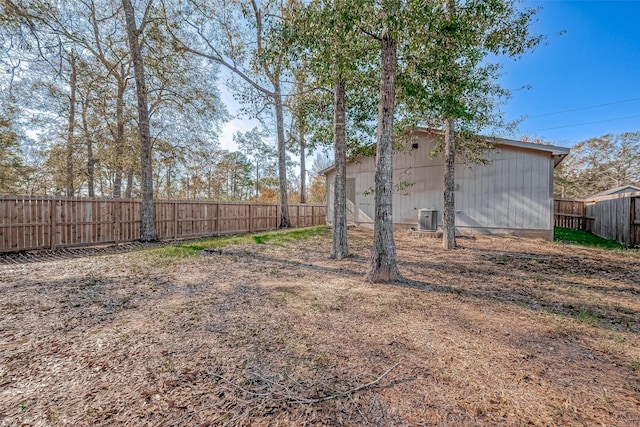 view of yard with central AC