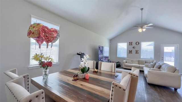 dining area featuring ceiling fan, dark hardwood / wood-style flooring, and lofted ceiling