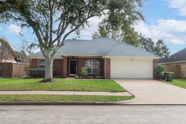 single story home with a front yard and a garage