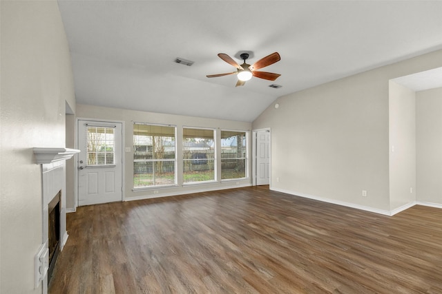 unfurnished living room with dark hardwood / wood-style floors, ceiling fan, and lofted ceiling