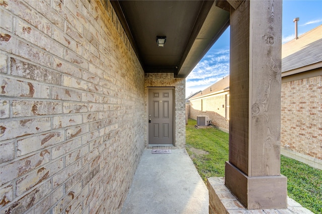 doorway to property with cooling unit