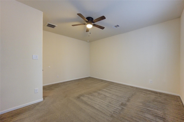 unfurnished room featuring carpet flooring and ceiling fan