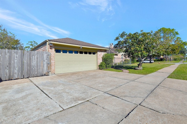 view of side of property with a yard