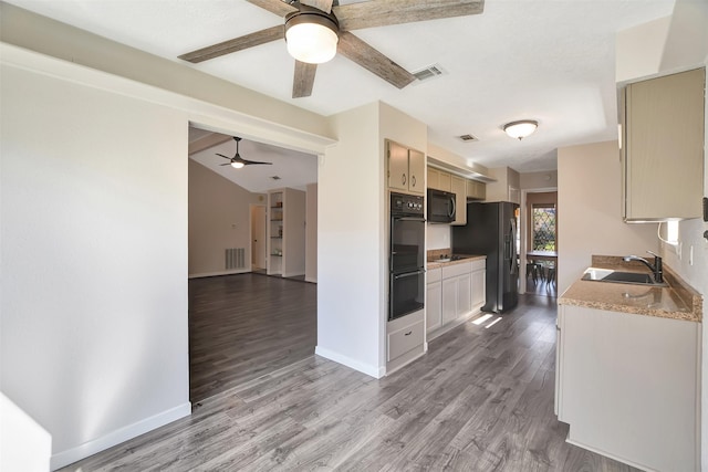 kitchen with sink, light hardwood / wood-style flooring, ceiling fan, and black appliances