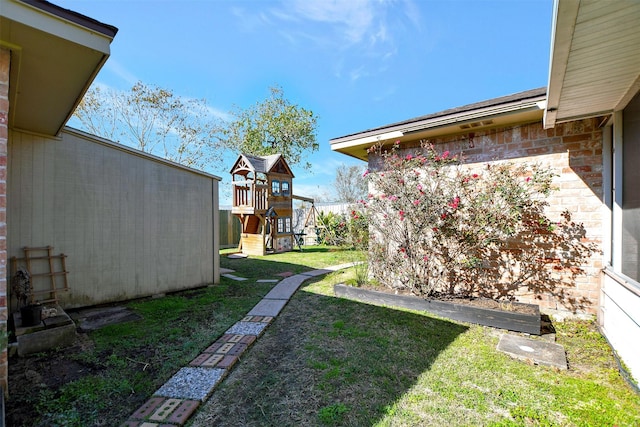 view of yard with a playground