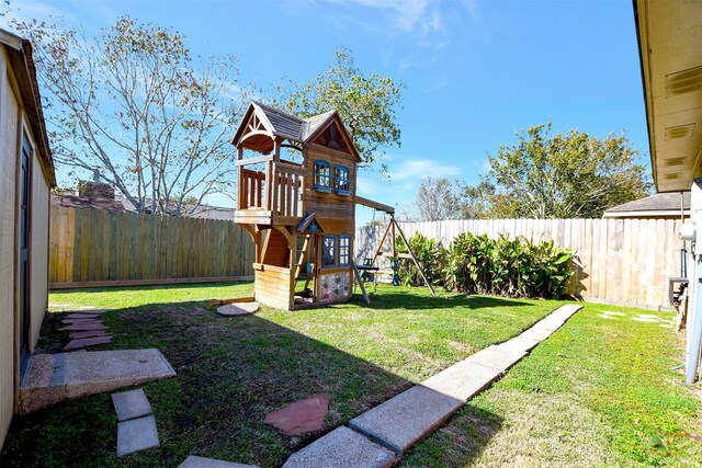 view of yard featuring a playground