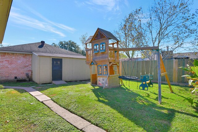 view of playground with a yard