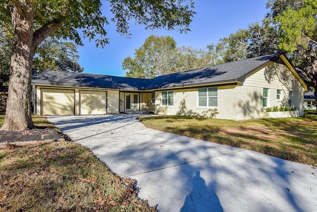 single story home with a garage