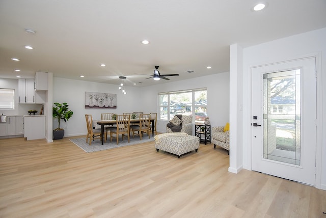 interior space featuring ceiling fan and light hardwood / wood-style floors