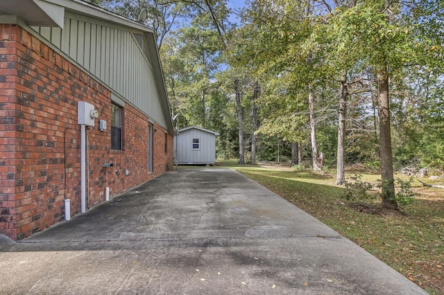 view of home's exterior with a shed