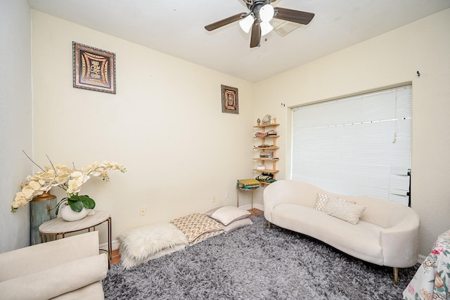 living room featuring ceiling fan