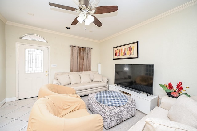 tiled living room featuring ceiling fan and ornamental molding