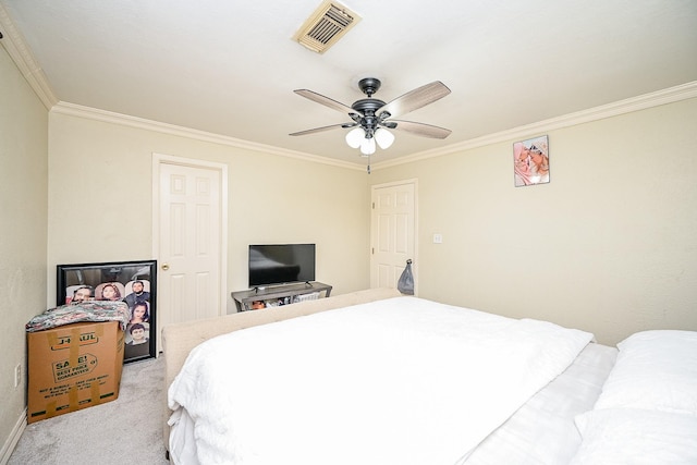 bedroom featuring ceiling fan, light colored carpet, and ornamental molding