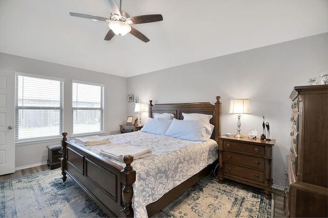 bedroom featuring ceiling fan and hardwood / wood-style flooring