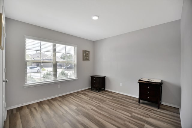 unfurnished room featuring light hardwood / wood-style flooring