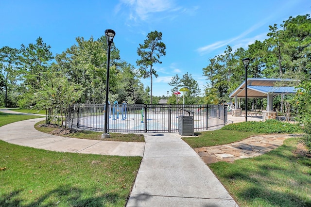 view of community with a gazebo and a lawn