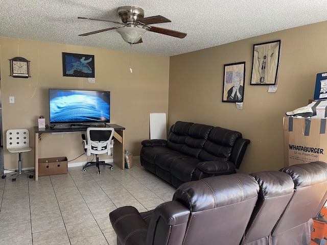 tiled living room with ceiling fan and a textured ceiling